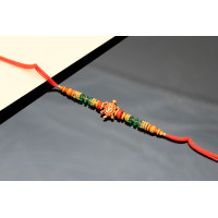 Om on Turtle back pattern Rakhi