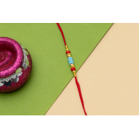 Blue pattern thread Rakhi