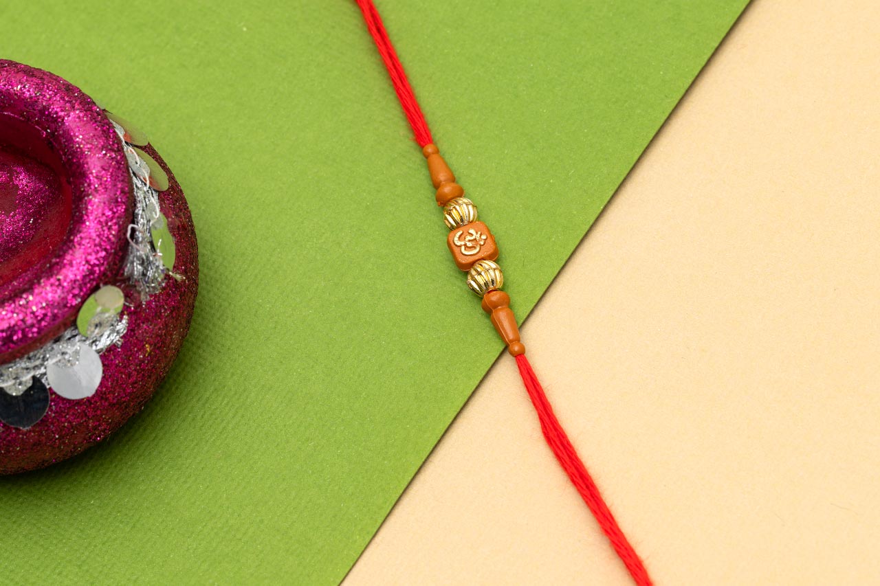 Alluring Om Thread Rakhi
