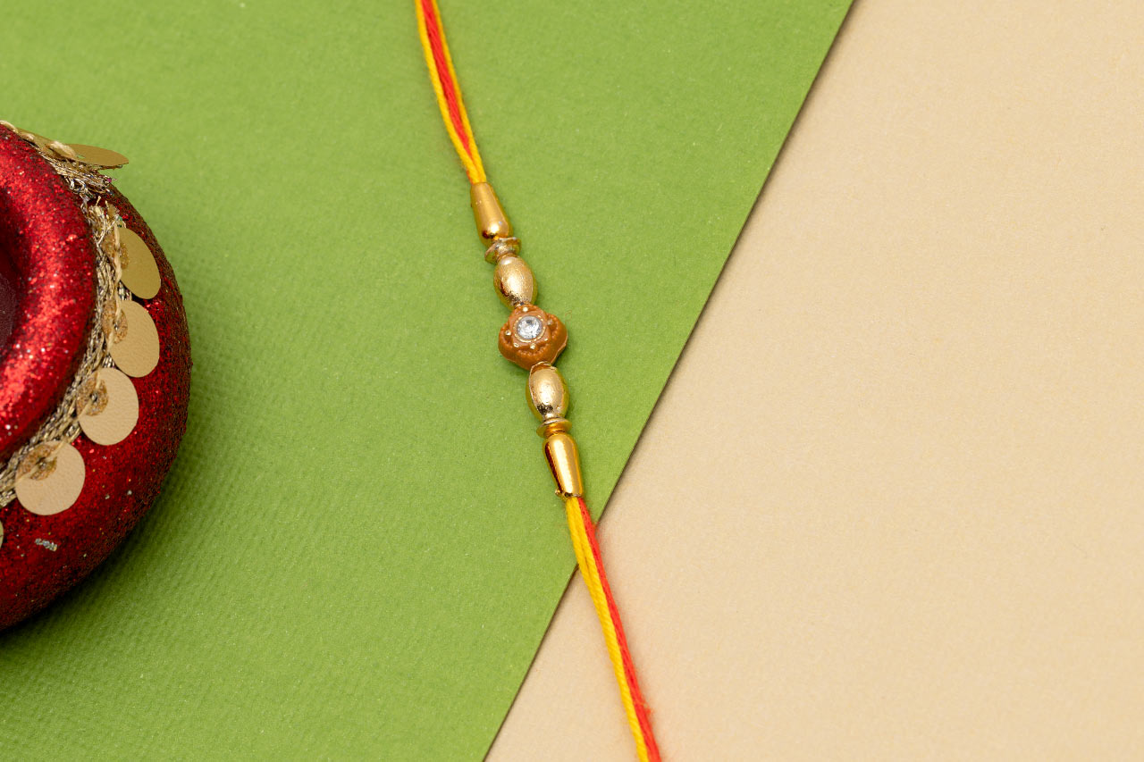 Alluring floral Thread Rakhi