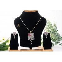 Square pendant with pink stone